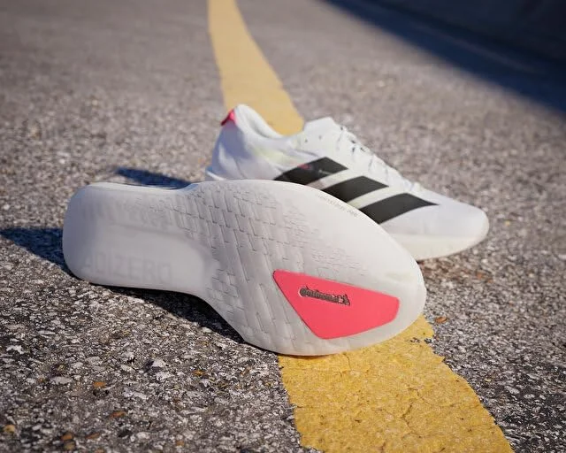 کفش های دویدن مردانه آدیداس آدیزرو ژاپن 9، سفید/مشکی/نقره ای متالیک (IF9419)