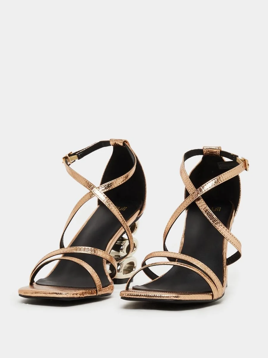 صندل پاشنه دار زنانه استایلی با بندهای فلزی صندل پاشنه دار زنانه استایلی با بندهای فلزی