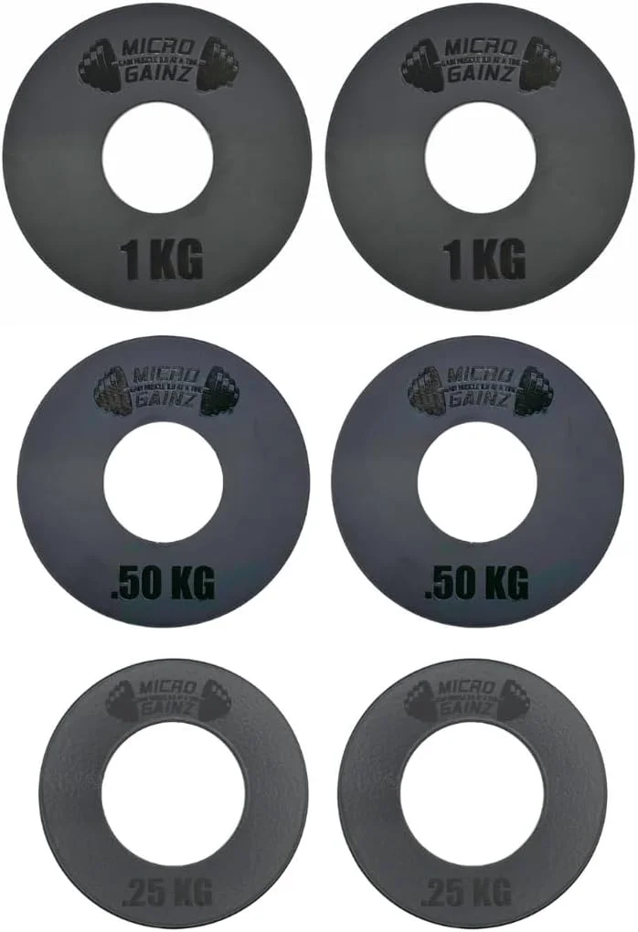 مجموعه وزنه های المپیکی کسری کیلوگرمی Micro Gainz شامل 6 صفحه فولادی - (2 عدد 0.25 کیلوگرمی، 2 عدد 0.50 کیلوگرمی، 2 عدد 1 کیلوگرمی) - طراحی شده برای هالترهای المپیکی، مورد استفاده برای تمرینات قدرتی و بارگذاری میکرو، ساخت ایالات متحده آمریکا مجموعه وزنه های المپیکی کسری کیلوگرمی Micro Gainz شامل 6 صفحه فولادی - (2 عدد 0.25 کیلوگرمی، 2 عدد 0.50 کیلوگرمی، 2 عدد 1 کیلوگرمی) - طراحی شده برای هالترهای المپیکی، مورد استفاده برای تمرینات قدرتی و بارگذاری میکرو، ساخت ایالات متحده آمریکا