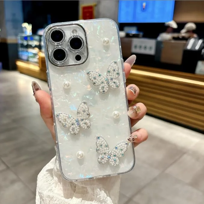 کاور محافظ ژله ای شفاف طرح پروانه و مروارید با اکلیل مناسب آیفون 17 پرو مکس، کاور دخترانه فانتزی نگین دار الماس با محافظت از جنس TPU نرم و ضد ضربه مناسب آیفون 17 پرو مکس 6.9 اینچ