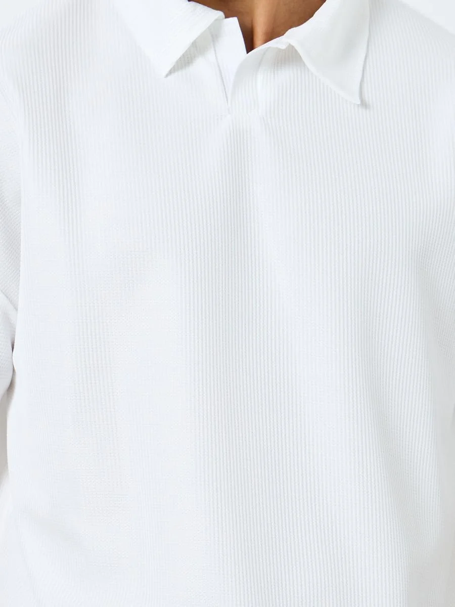 پولوشرت مردانه استایلی با بافت طرح‌دار و مدل آزاد با یقه باز