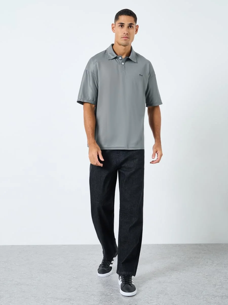 پولوشرت مردانه استایلی خاکستری اورسایز با دکمه پولوشرت مردانه استایلی خاکستری اورسایز با دکمه