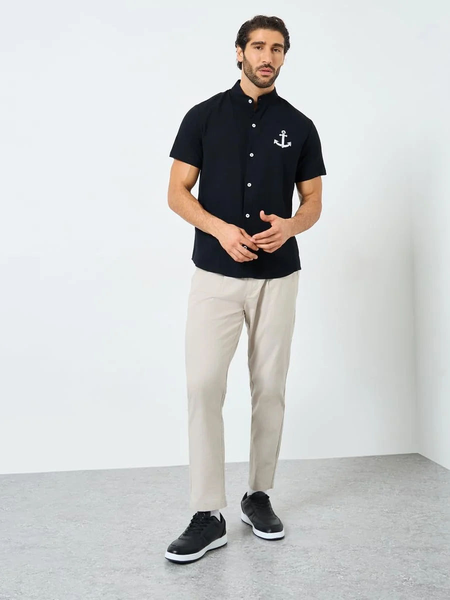 پیراهن آستین کوتاه مردانه STYLI با طرح گرافیکی و دکمه دار پیراهن آستین کوتاه مردانه STYLI با طرح گرافیکی و دکمه دار