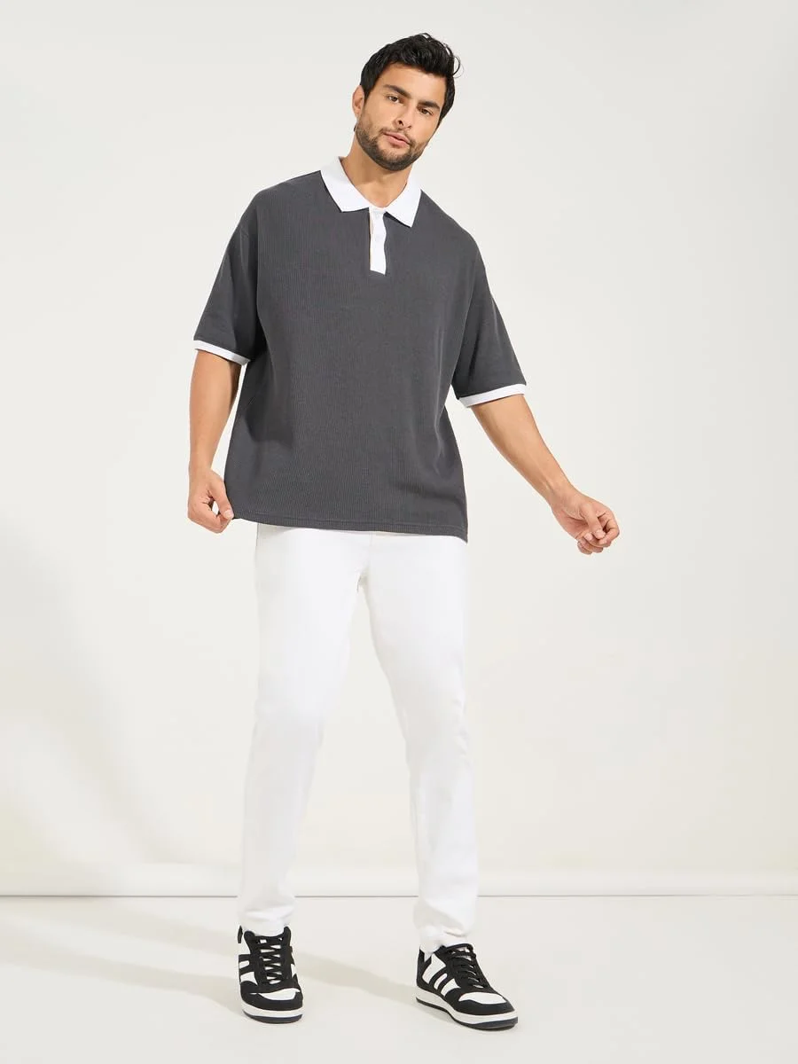 پولوشرت مردانه استایلی مدل 7008431714 بافت وافل سایز بزرگ با جزئیات متضاد