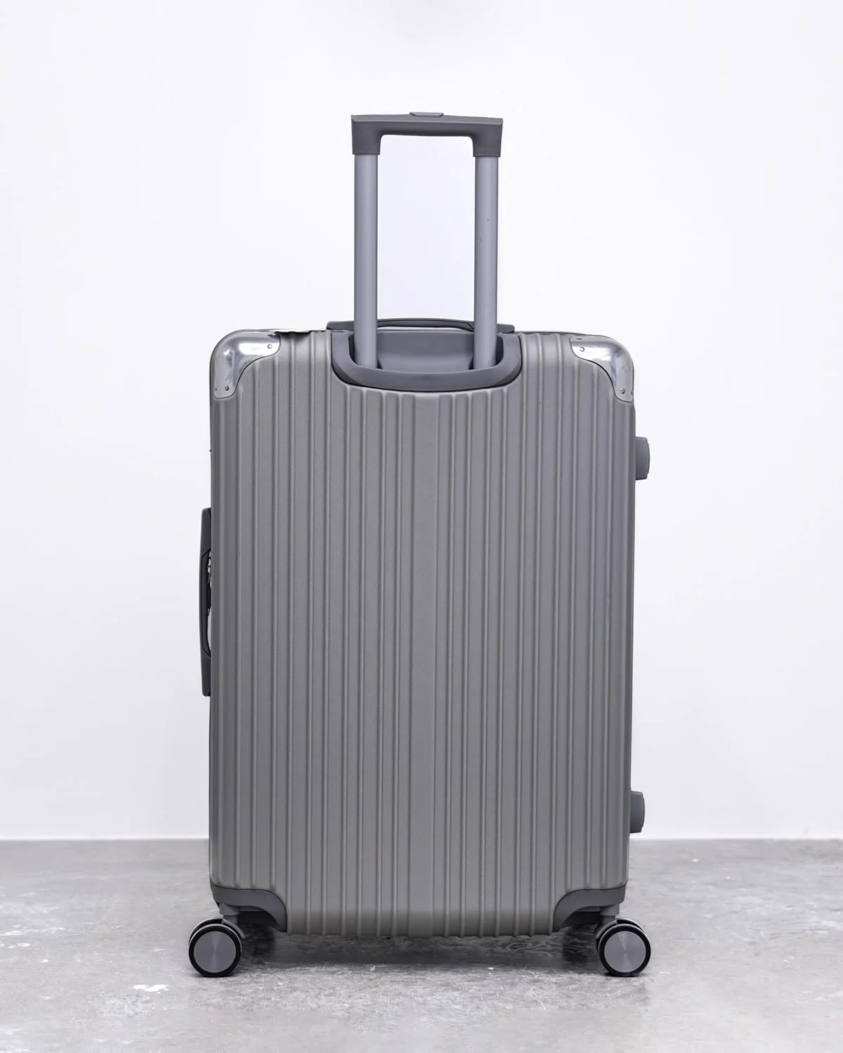 چمدان چرخشی سخت - سایز 28 اینچ (74 سانتی متر)، جنس: ABS، نقره ای چمدان چرخشی سخت - سایز 28 اینچ (74 سانتی متر)، جنس: ABS، نقره ای