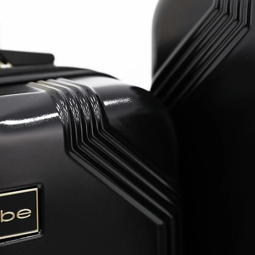 چمدان چرخشی سبک وزن BEBE Eugenia با قفل TSA (مشکی/طلایی، سایز 20 اینچ)