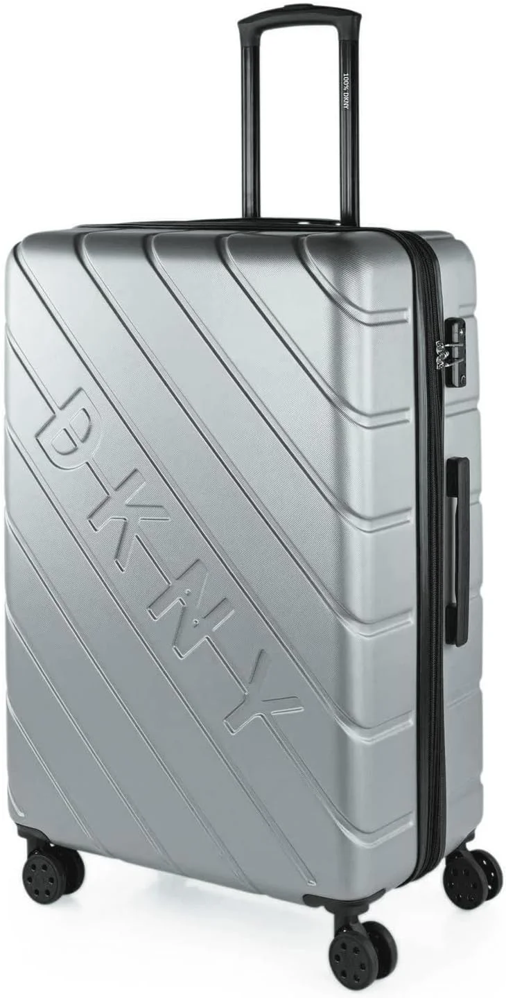 چمدان چرخ‌دار سخت DKNY مدل Side Tracked مناسب برای آقایان و بانوان | ABS فوق‌العاده سبک با چرخ‌های اسپینر 4 چرخ دوبل 78.7 طول X 30.5 عرض X 51.4 ارتفاع نقره‌ای