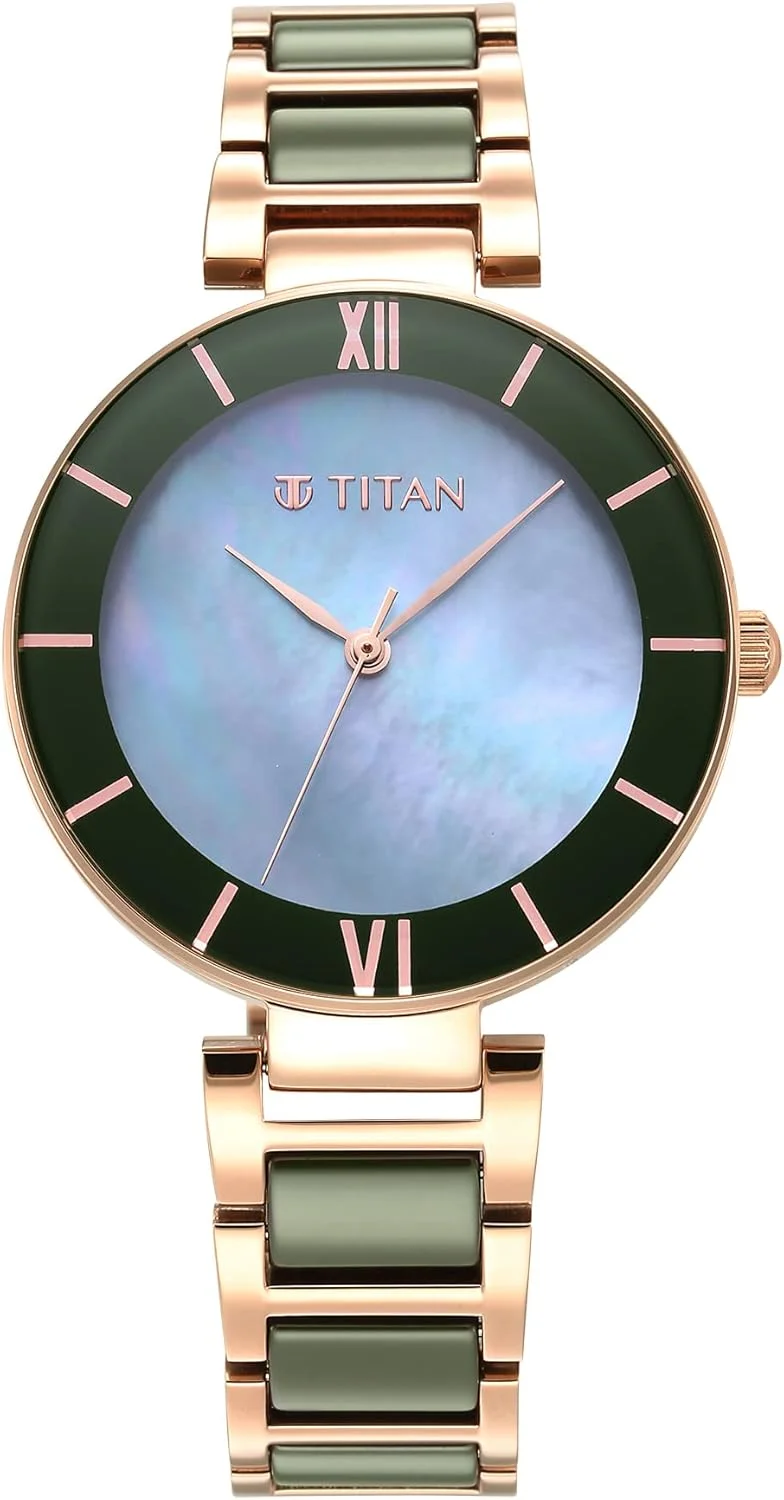 ساعت مچی زنانه تایتان با صفحه سبز و بند استیل و سرامیک بنفش - NS95216KD01