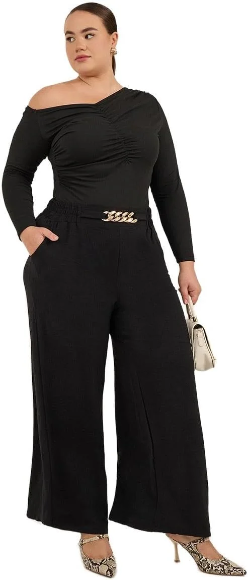 شلوار زنانه سایز بزرگ استایلی با بافت و پاچه گشاد به همراه سگک زنجیری