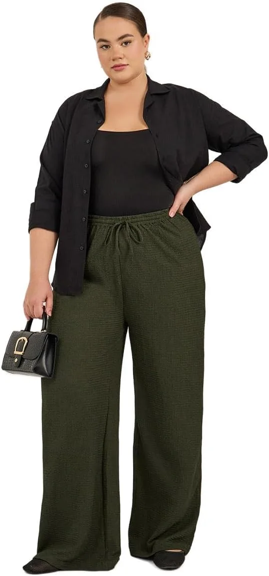 شلوار زنانه سایز بزرگ استایلی با بافت و پاچه گشاد و بند کشی