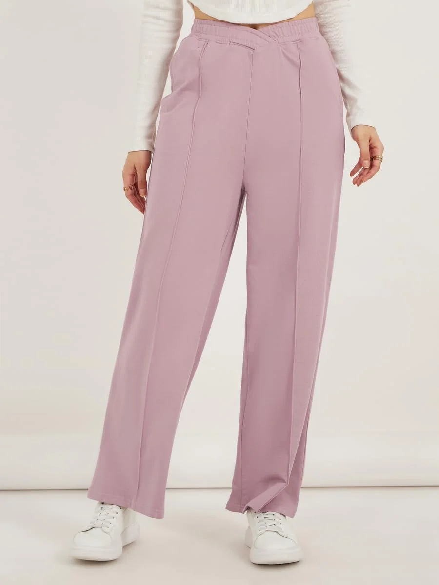 شلوار جاگر زنانه استایلی با کمر ضربدری و جزئیات پین‌تاک