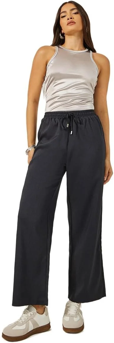 شلوار زنانه استایلی با فاق متوسط و پاچه گشاد و بند کشی