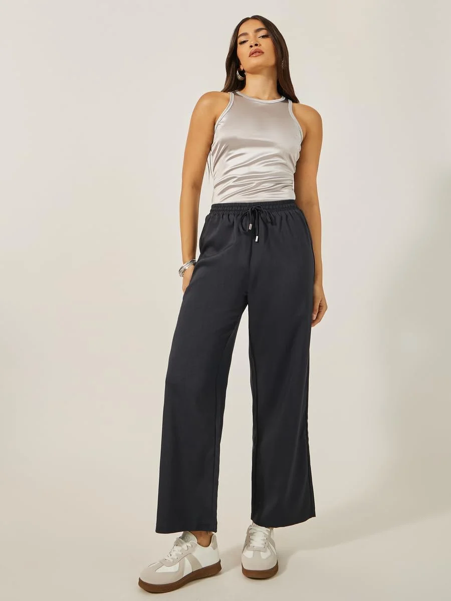 شلوار زنانه استایلی با فاق متوسط و پاچه گشاد و بند کشی