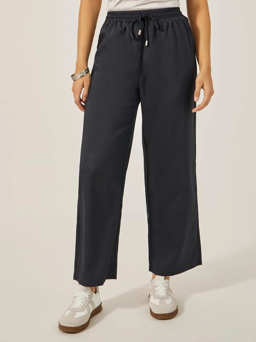 شلوار زنانه استایلی با فاق متوسط و پاچه گشاد و بند کشی