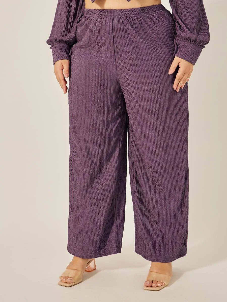 شلوار زنانه سایز بزرگ استایلی، بافت‌دار، فاق متوسط و پاچه گشاد