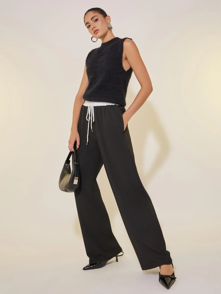 شلوار زنانه استایلی، طرح ساده، مدل آزاد با جزئیات گیپور و بند