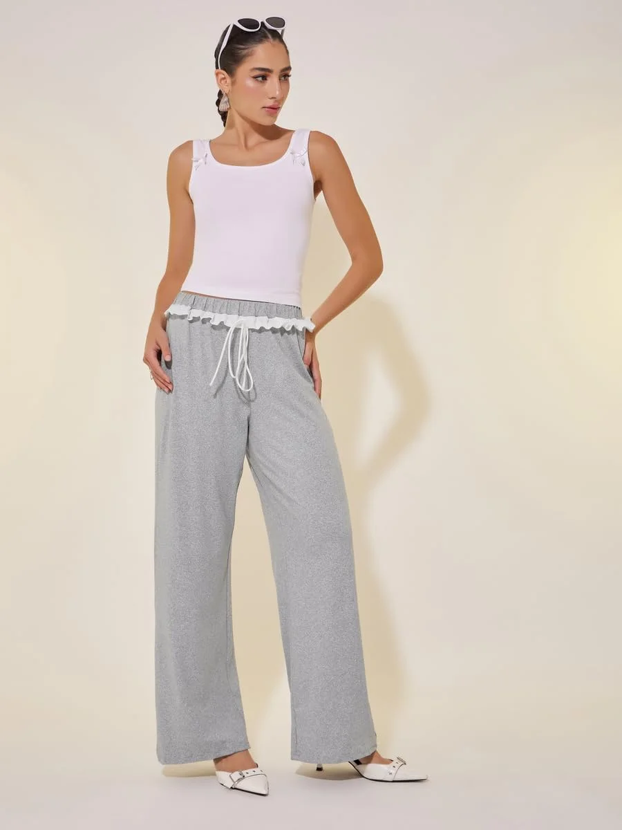 شلوار زنانه استایلی، طرح ساده، مدل آزاد، دارای جزئیات گیپور و بند