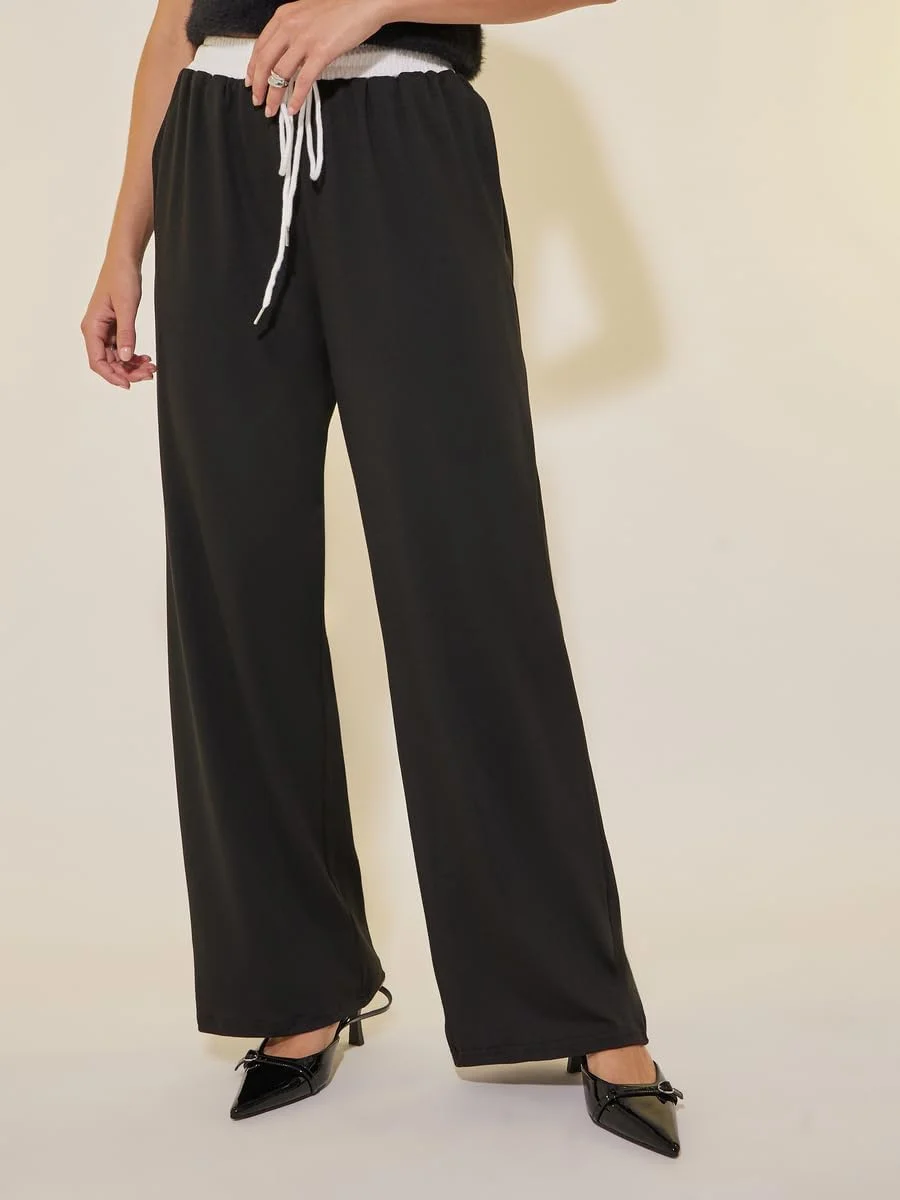 شلوار زنانه استایلی، طرح ساده، مدل آزاد با جزئیات گیپور و بند