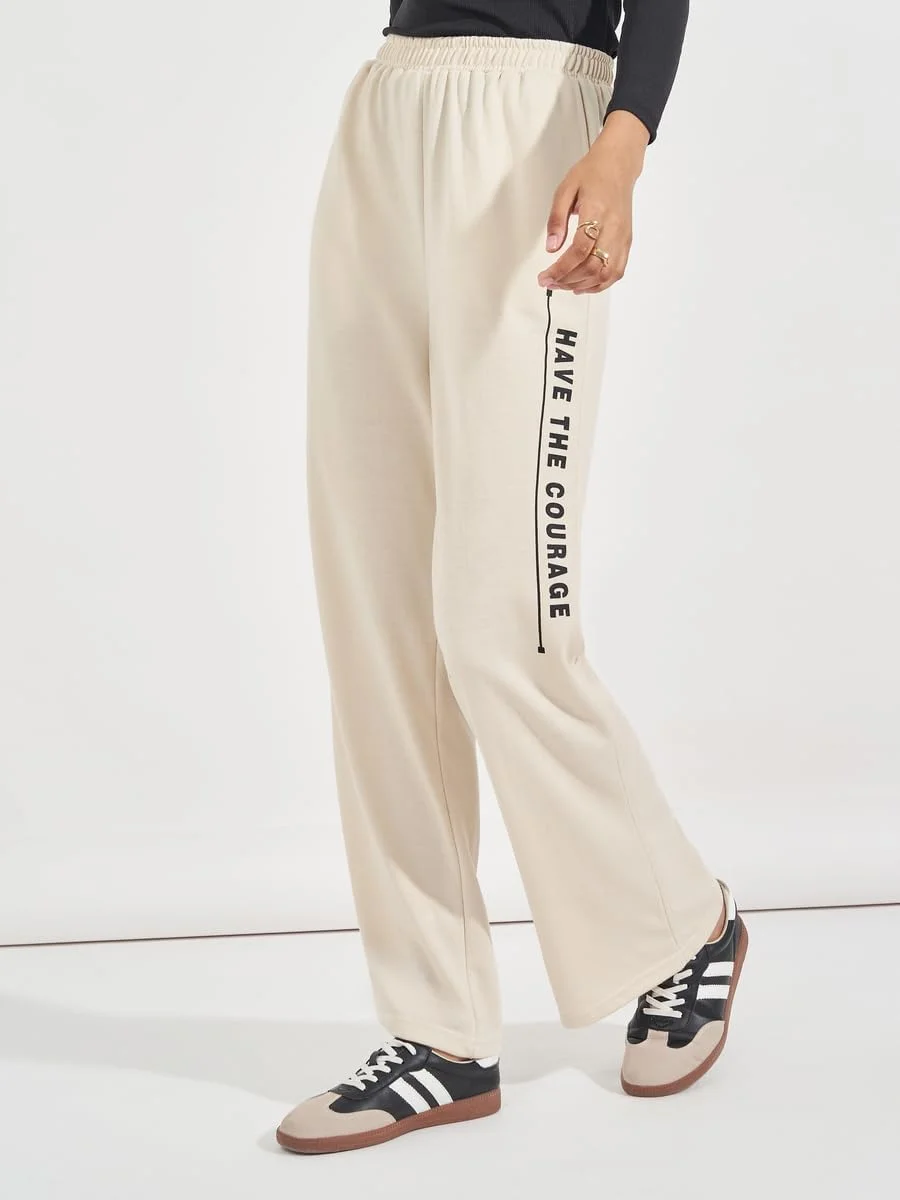 شلوار جاگر زنانه استایلی با کمر بلند و طرح نوشته