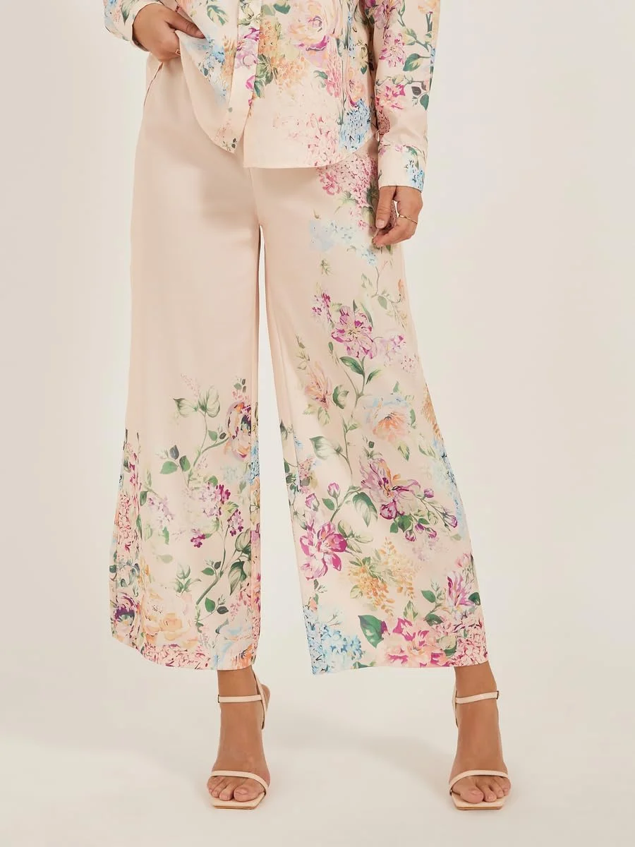 شلوار زنانه استایلی با طرح گل و پاچه گشاد و بند تنظیم