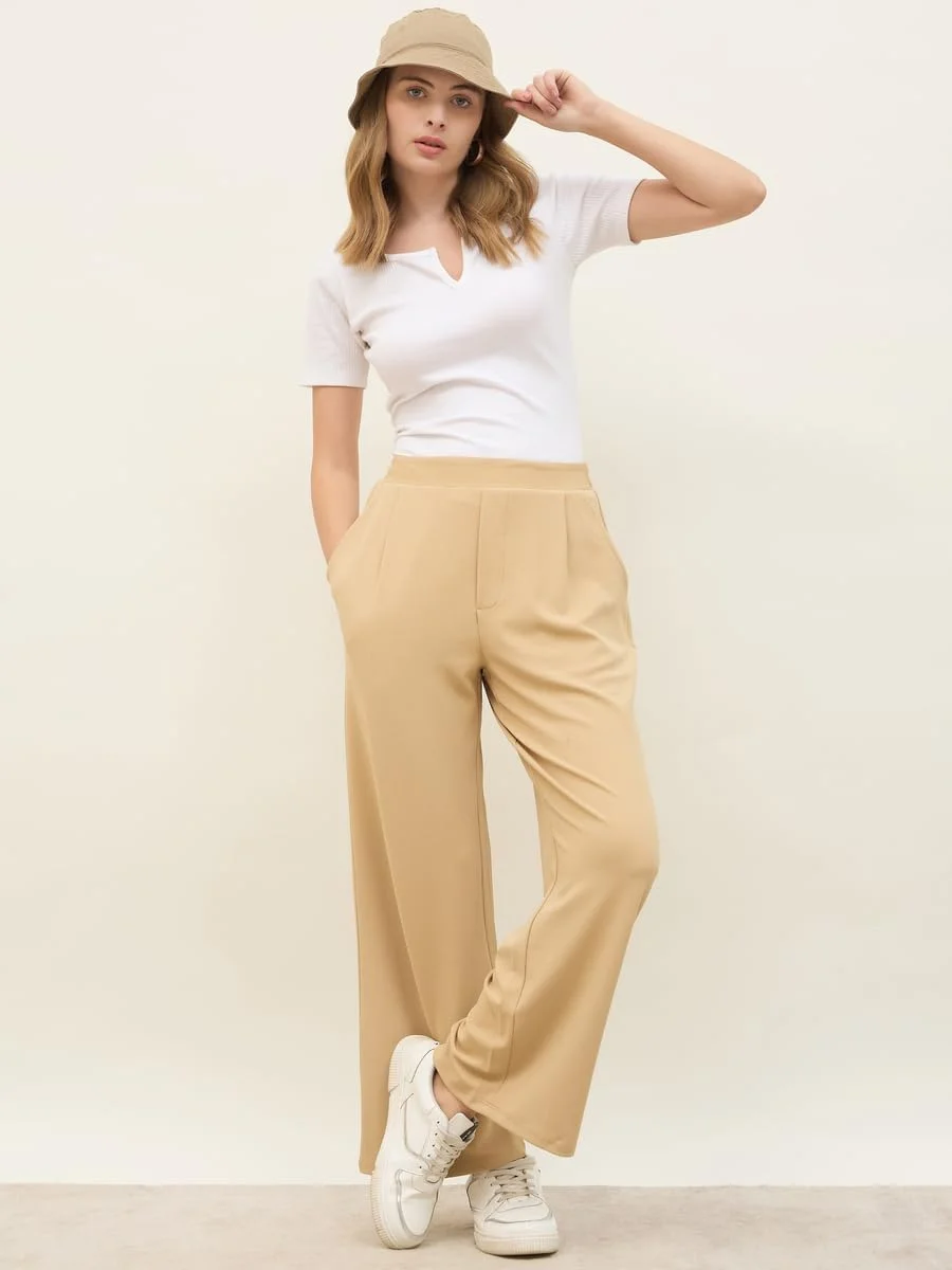 شلوار زنانه استایلی با فاق متوسط و پاچه گشاد و کمر کشی شلوار زنانه استایلی با فاق متوسط و پاچه گشاد و کمر کشی