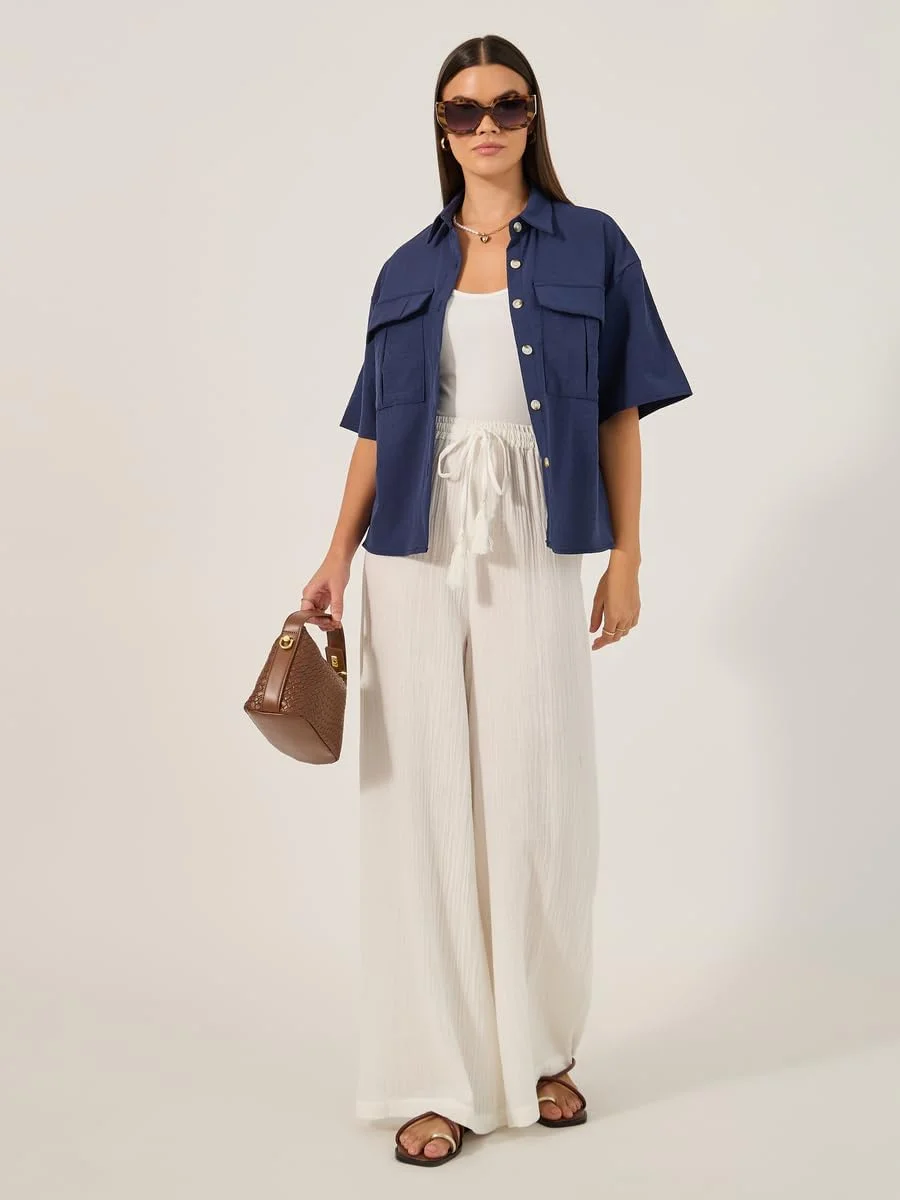 شلوار زنانه استایلی، فاق بلند، پاچه گشاد، دارای بند شلوار زنانه استایلی، فاق بلند، پاچه گشاد، دارای بند