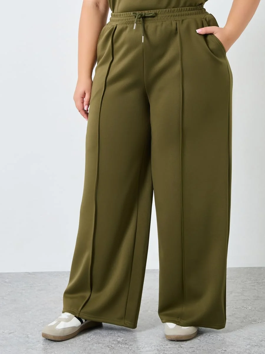 شلوار جاگر زنانه استایلی سایز بزرگ، رنگ خاکی، پاچه گشاد