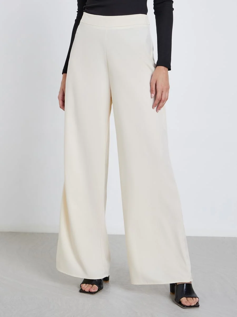 شلوار زنانه استایلی کرم پاچه گشاد