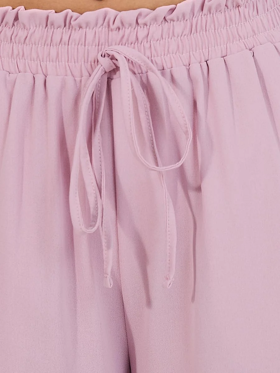 شلوار زنانه استایلی با کمر کاغذی و پاچه گشاد شلوار زنانه استایلی با کمر کاغذی و پاچه گشاد