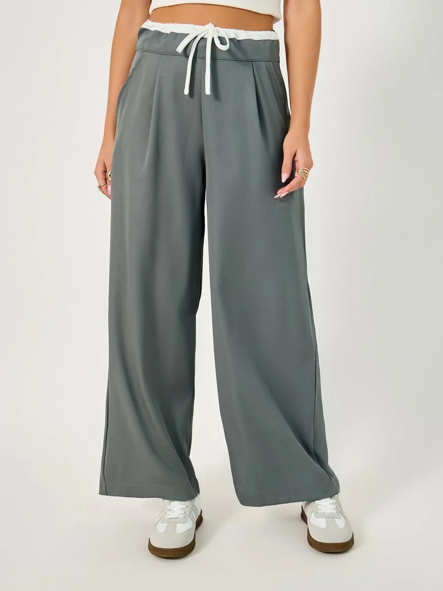 شلوار زنانه دمپا گشاد استایلی با بند کمر کشی متضاد شلوار زنانه دمپا گشاد استایلی با بند کمر کشی متضاد