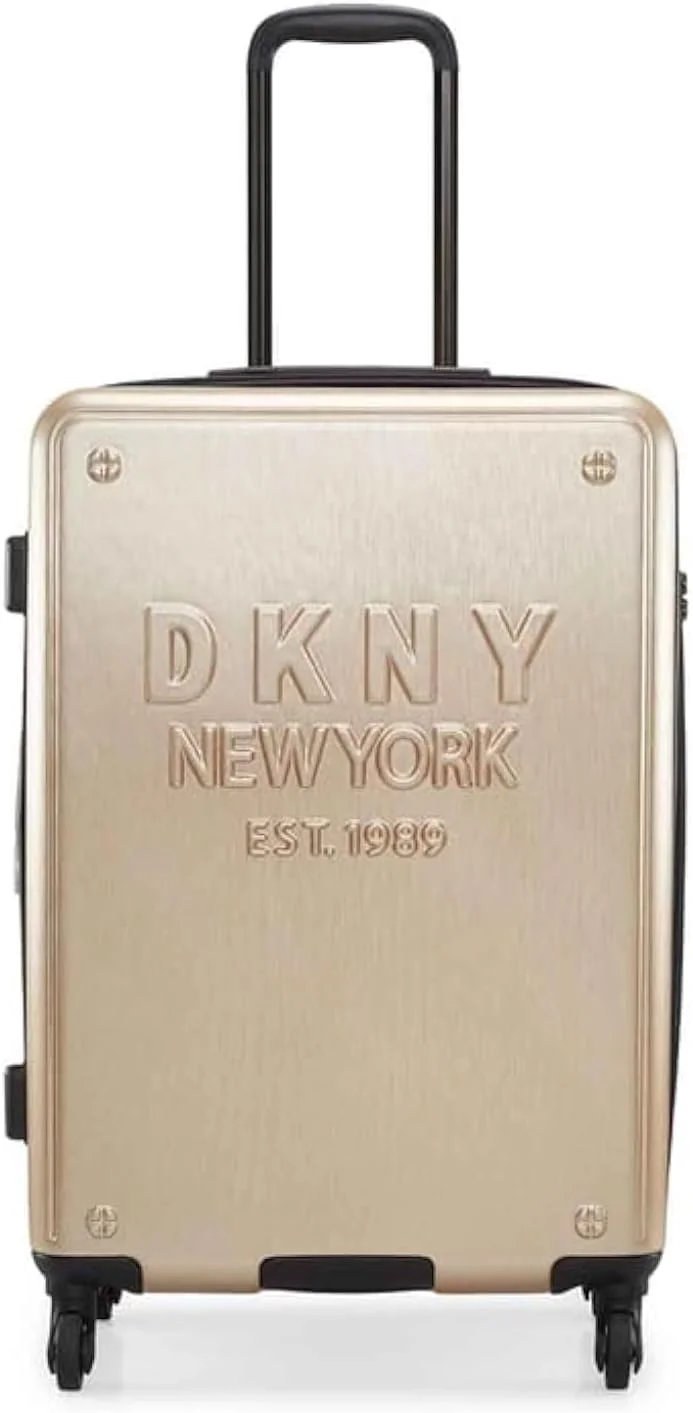 چمدان سخت نیویورکر DKNY، جنس ABS، رنگ شامپاین، سایز 24 اینچ