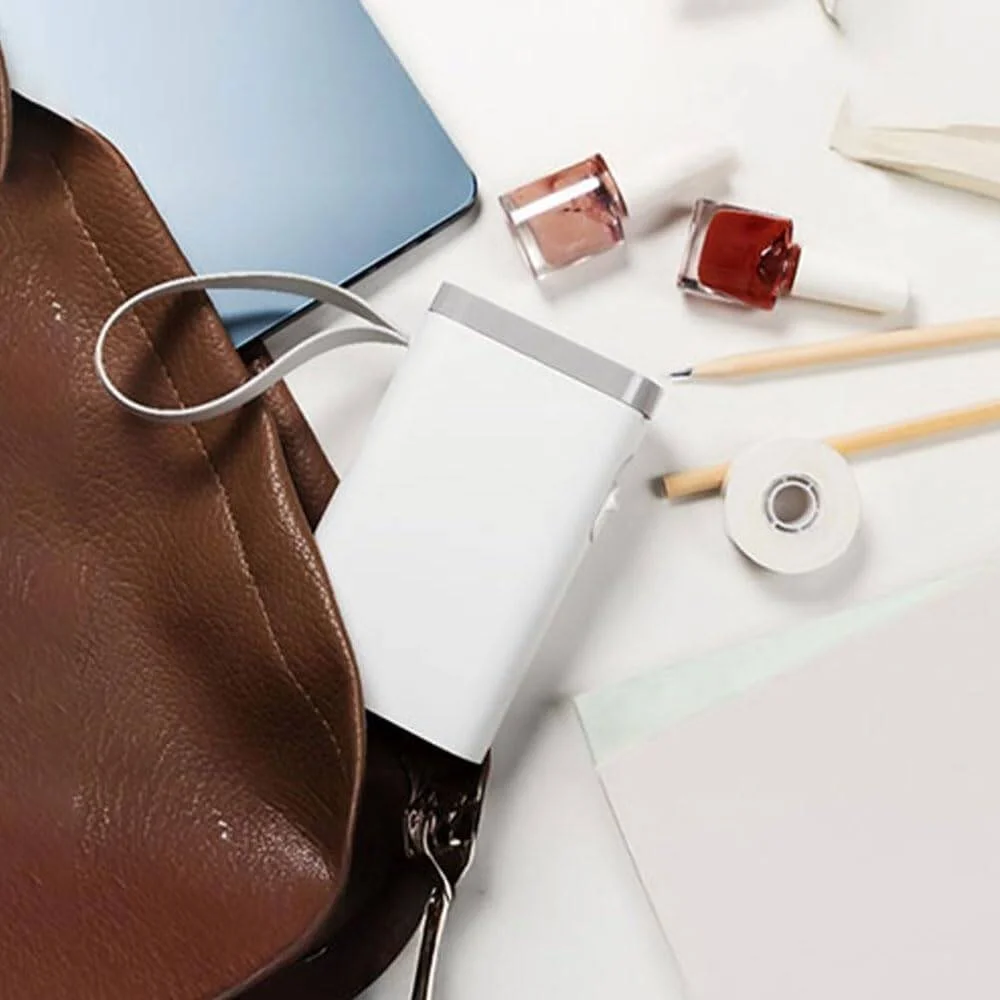 پرینتر حرارتی برچسب زن گرین لاین Snap Label 14 میلی‌متری، 1000 بار چاپ، بیش از 160 قالب متنوع، برچسب‌های چسبنده قوی، کاغذ گازی، طول عمر هد چاپ 50 کیلومتر، سرعت چاپ 20 میلی‌متر بر ثانیه، عرض کاغذ 14 میلی‌متر، 203 DPI