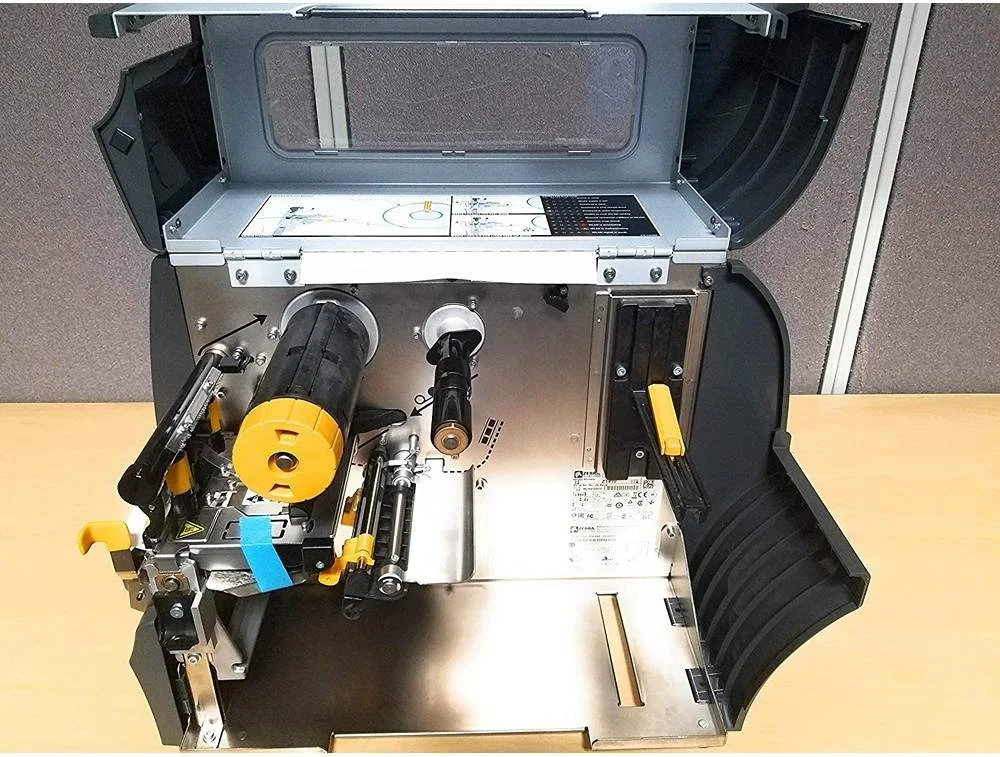 چاپگر لیبل بارکد زبرا ZT411 با کارایی بالا، رزولوشن چاپ 300dpi، سرعت چاپ 14.0 ips، نمایشگر LCD، انتقال حرارتی، عرض چاپ 4.1 اینچ، USB، اترنت، بلوتوث، خاکستری | ZT41143-T0E0000Z چاپگر لیبل بارکد زبرا ZT411 با کارایی بالا، رزولوشن چاپ 300dpi، سرعت چاپ 14.0 ips، نمایشگر LCD، انتقال حرارتی، عرض چاپ 4.1 اینچ، USB، اترنت، بلوتوث، خاکستری | ZT41143-T0E0000Z