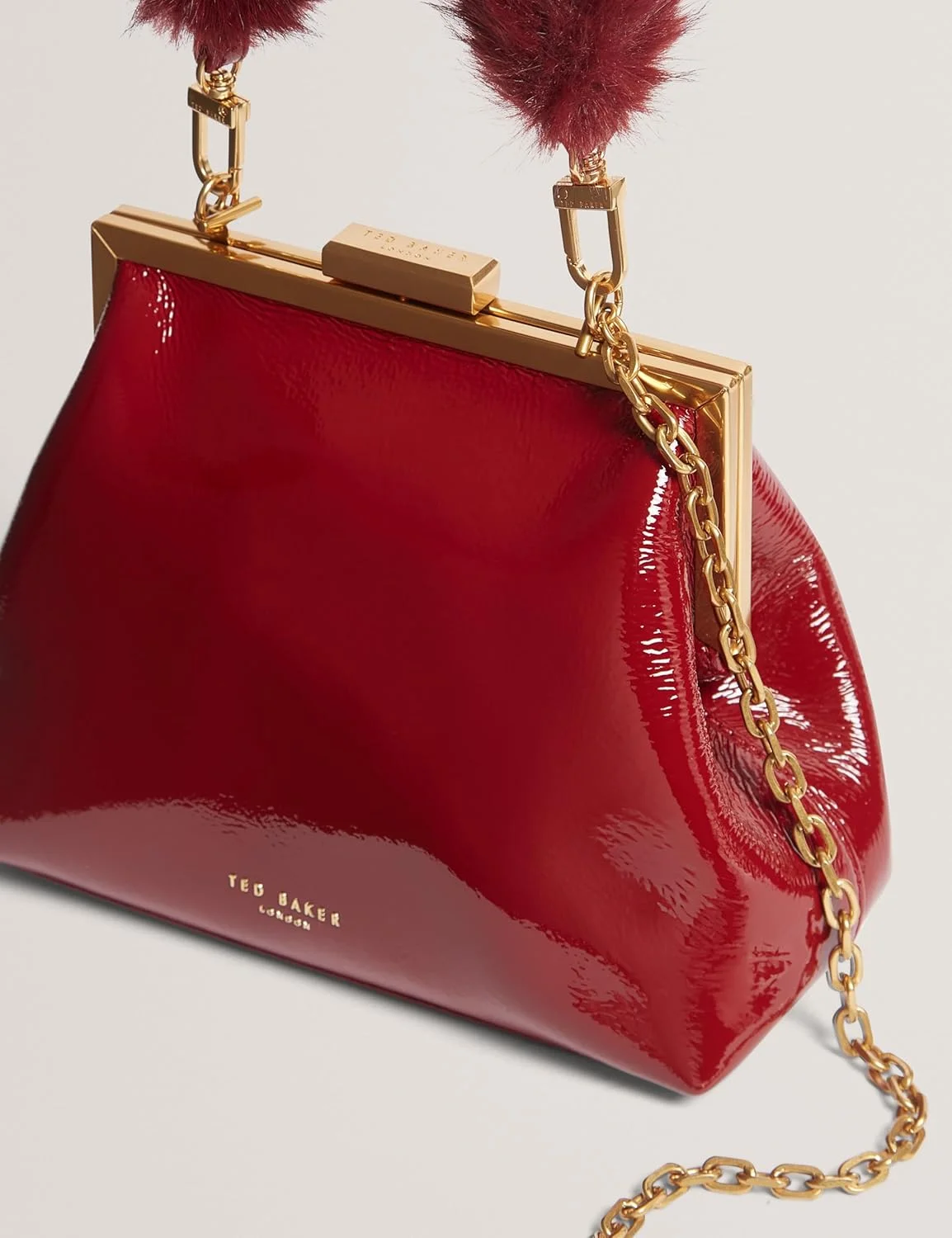 کیف کلاچ چرمی پِرِسِل تِد بیکر با دسته خزدار، سایز واحد، قرمز