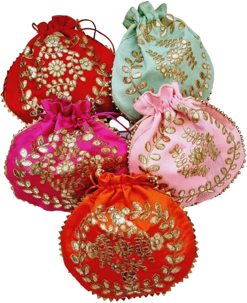 کیف دستی گرد پولکی پیهس پلنت با دسته مرواریدی (سبز پسته ای)