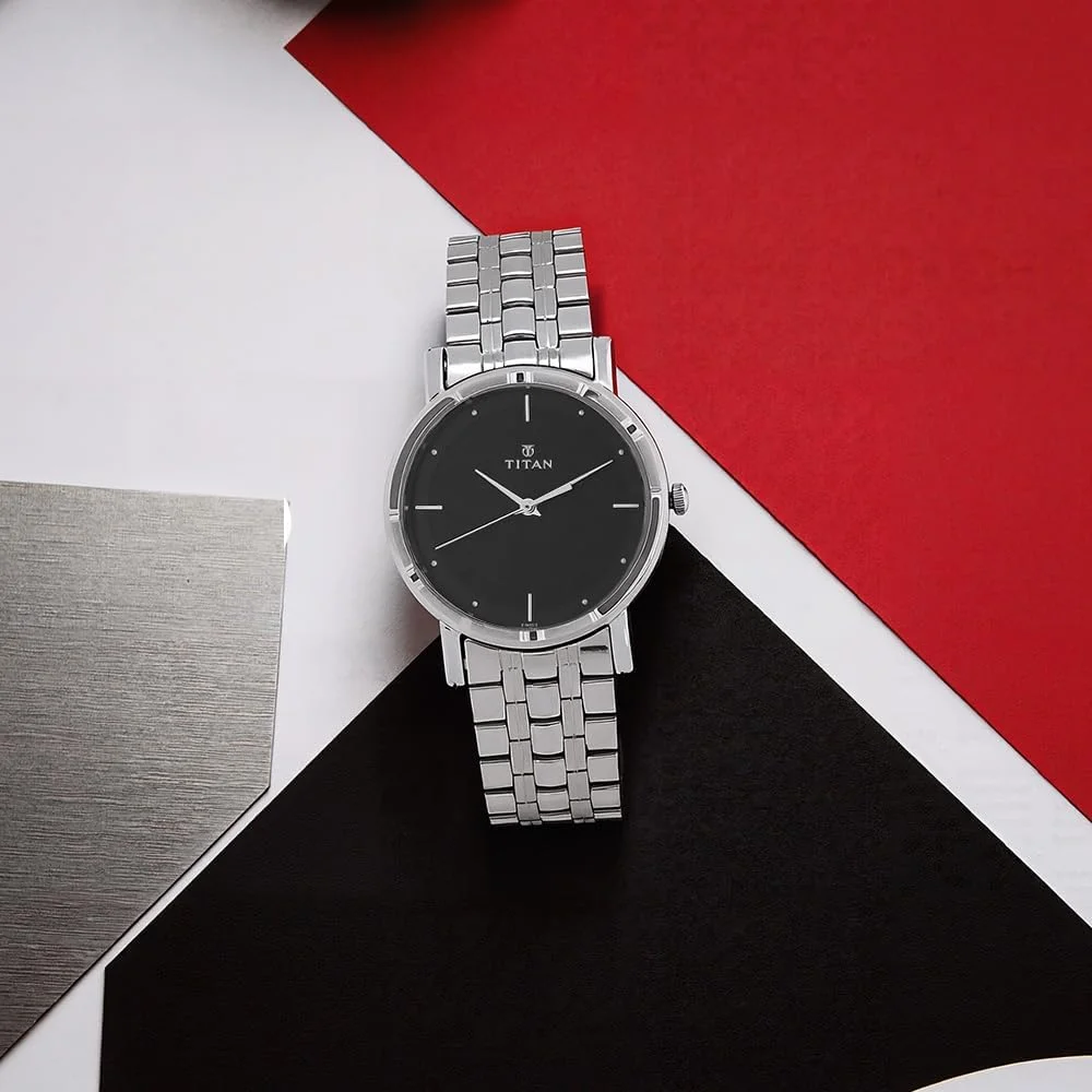 ساعت مچی آنالوگ گرد تایتان کاریشما مردانه