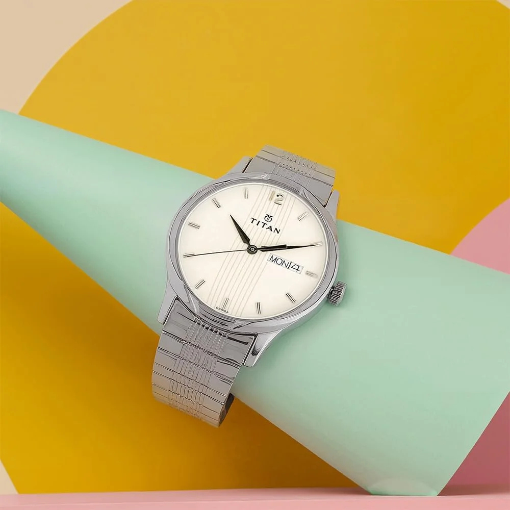 ساعت مچی مردانه تایتان کاریسما مدل آنالوگ با صفحه نقره ای - NK1580SM03