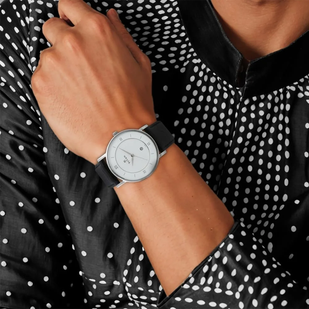 ساعت مچی مردانه تایتان کلاسیک آنالوگ با صفحه گرد سفید و بند چرمی مشکی - 9162SL04