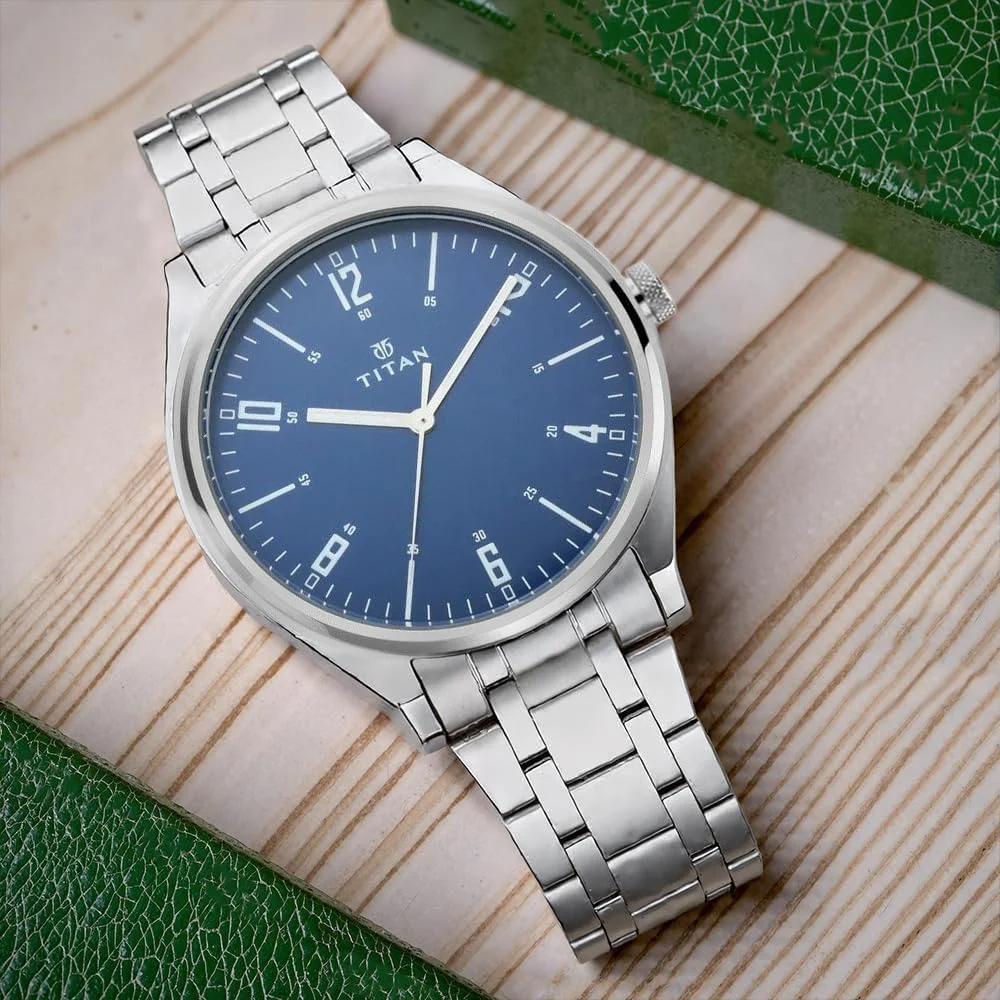 ساعت مچی مردانه تایتان Neo Iv با صفحه آبی آنالوگ مدل NL1802SM02/NP1802SM02، نقره ای آبی، بند