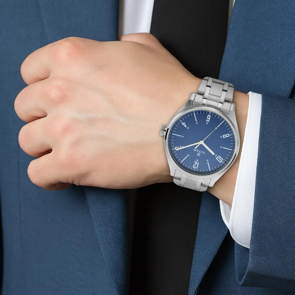 ساعت مچی مردانه تایتان Neo Iv با صفحه آبی آنالوگ مدل NL1802SM02/NP1802SM02، نقره ای آبی، بند