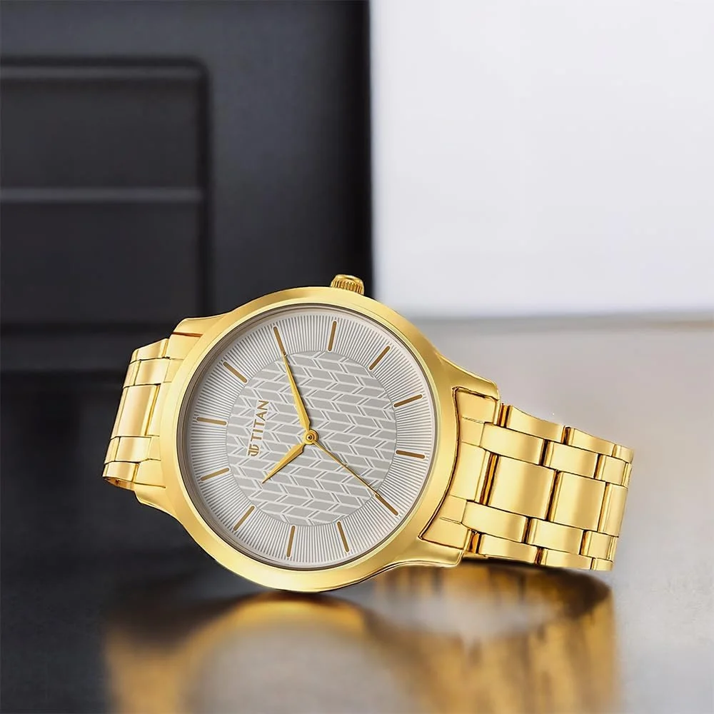 ساعت مچی مردانه تایتان مدل آنالوگ با صفحه سفید - 1825YM06، آبکاری زرد