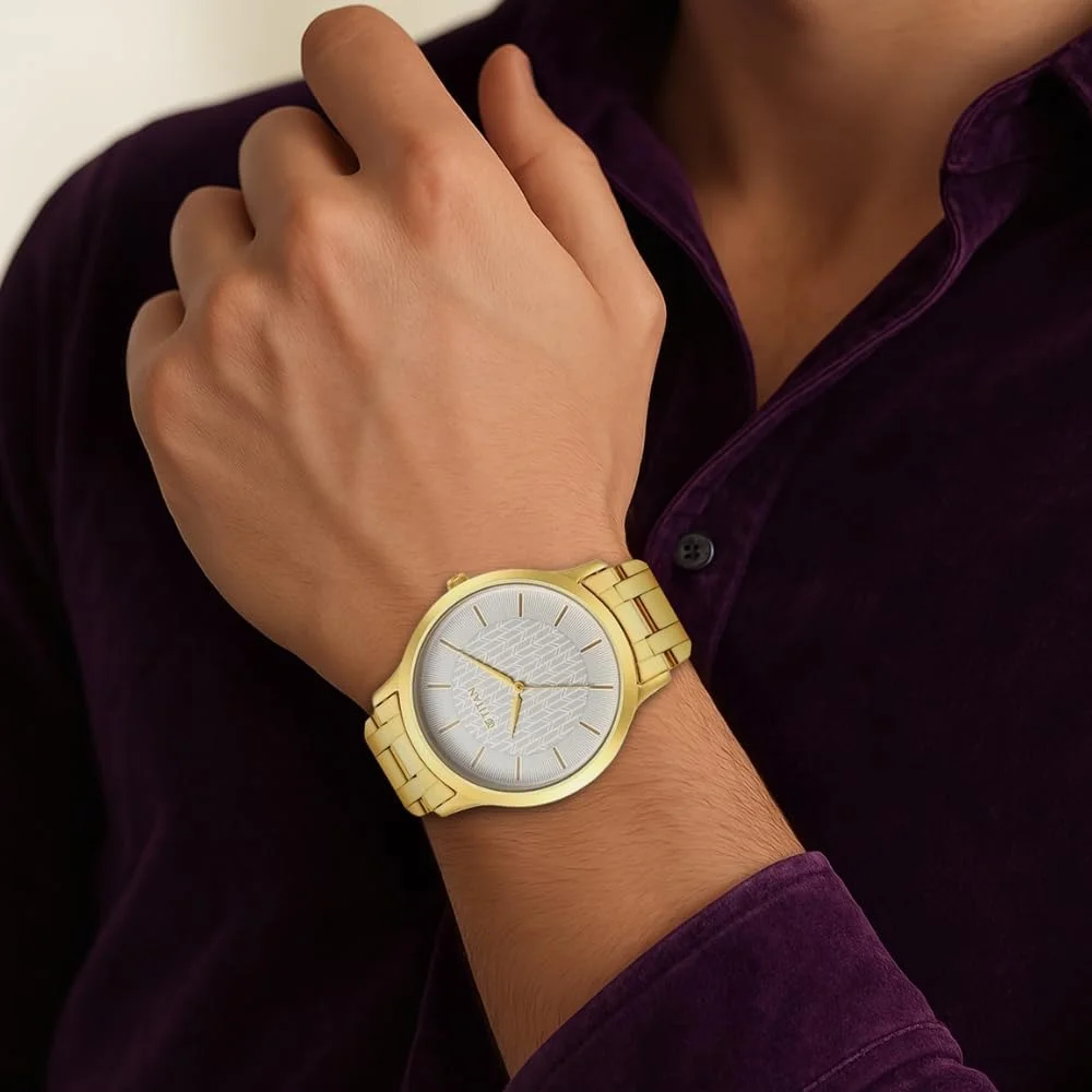 ساعت مچی مردانه تایتان مدل آنالوگ با صفحه سفید - 1825YM06، آبکاری زرد