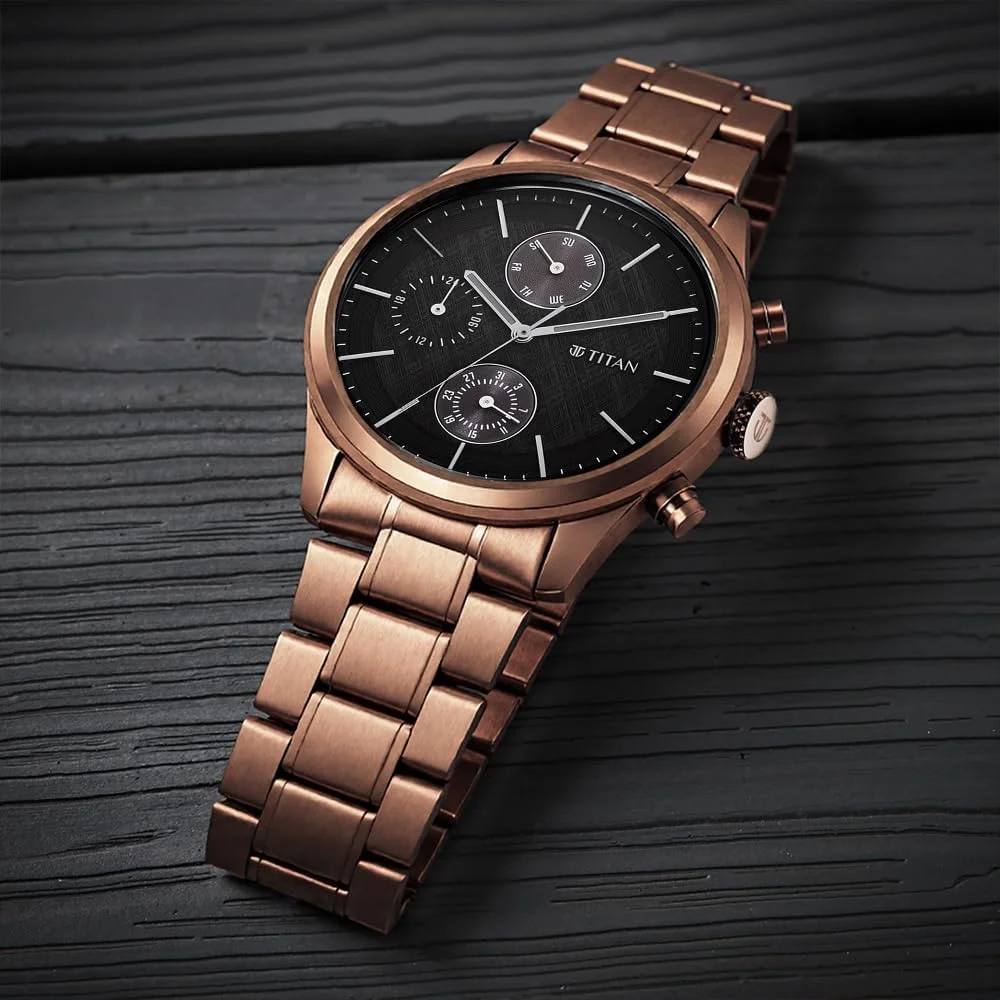 ساعت مچی مردانه تیتان مدل آنالوگ با صفحه مشکی و بند قهوه ای استیل - 1805QM04/NR1805QM04
