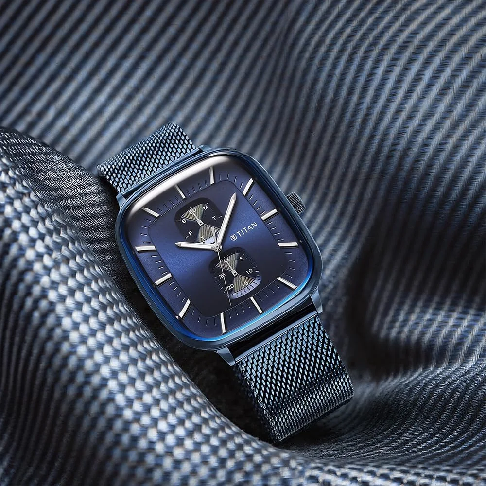 ساعت مچی مردانه تیتان آنالوگ با صفحه آبی و روکش آبی