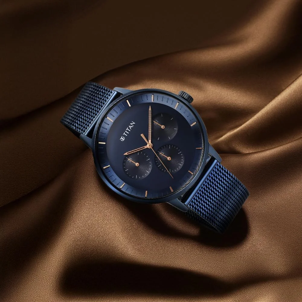 ساعت مچی مردانه تیتان آنالوگ با صفحه آبی و روکش آبی