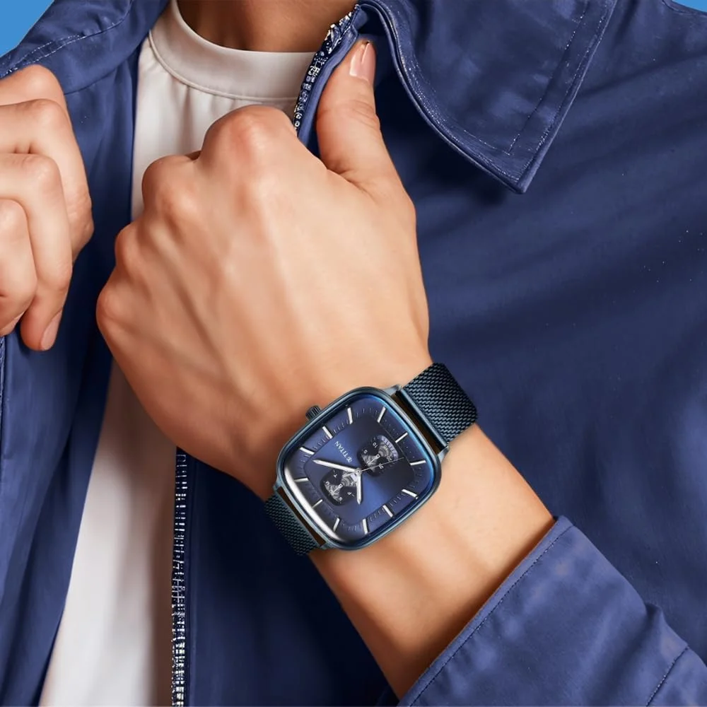 ساعت مچی مردانه تیتان آنالوگ با صفحه آبی و روکش آبی