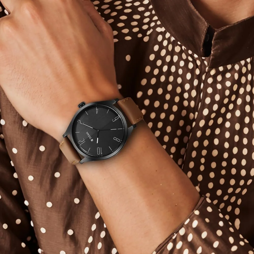 ساعت مچی مردانه تیتان مدل آنالوگ با صفحه مشکی - NP1865NL01/NP1865NL01