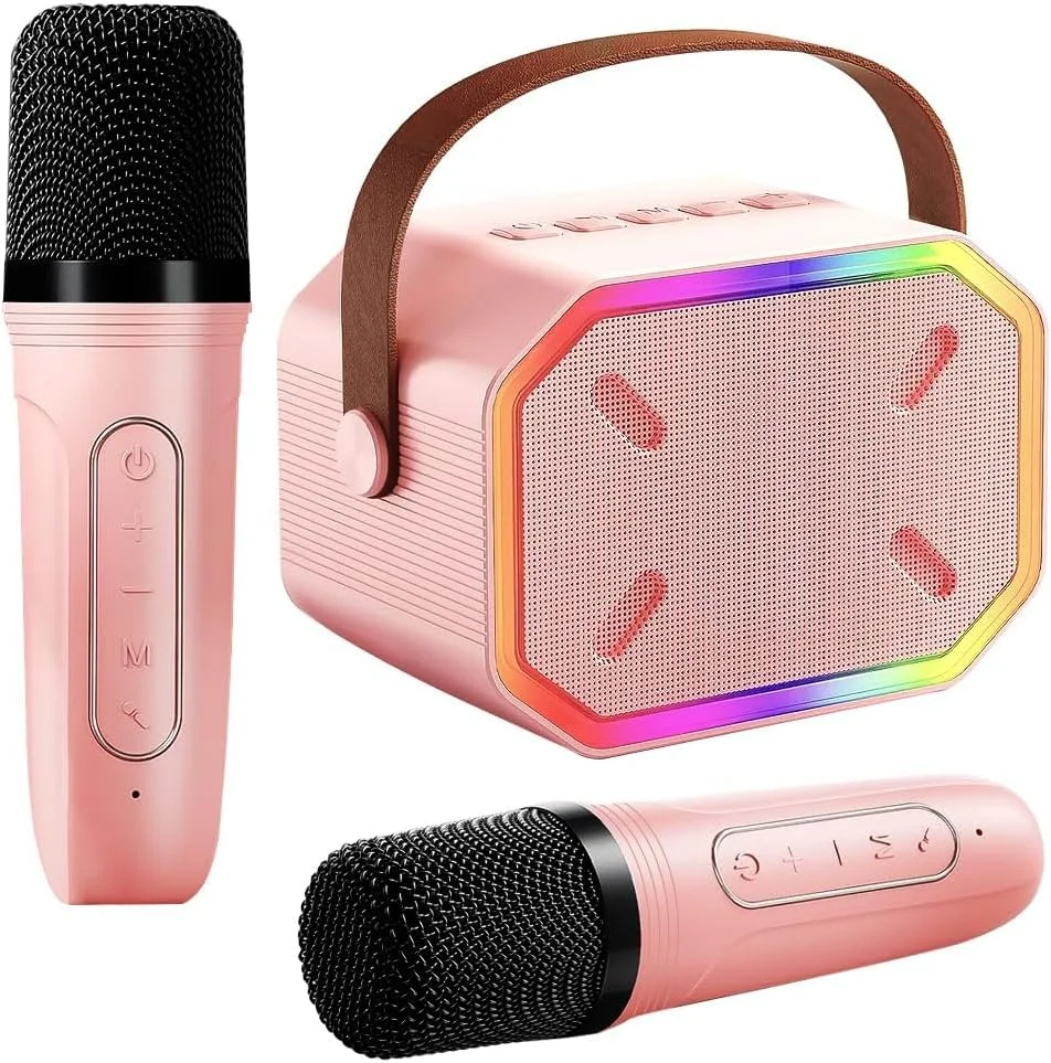 دستگاه کارائوکه قابل حمل KASTWAVE، بلوتوث 5.3، بلندگوی کارائوکه با 2 میکروفون بی سیم، چراغ های LED، صدای جادویی، باتری با ظرفیت بالا، هدیه تولد مهمانی خانوادگی، هدیه کودکان برای دختران پسر، صورتی
