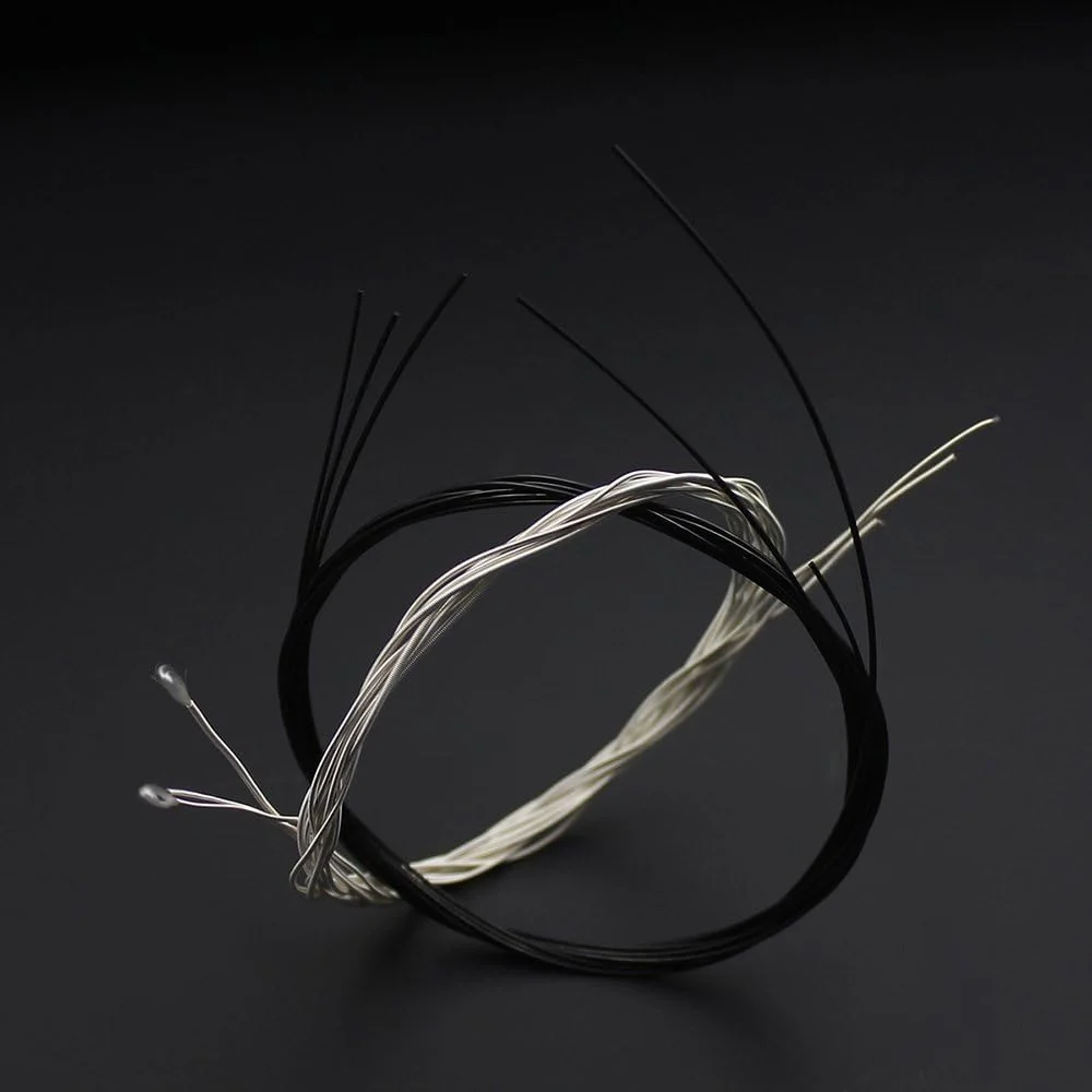 سیم گیتار OUNA، 6 عدد در هر بسته (.028-.043) سیم گیتار کلاسیک نایلونی دو رنگ با کشش معمولی سیم گیتار OUNA، 6 عدد در هر بسته (.028-.043) سیم گیتار کلاسیک نایلونی دو رنگ با کشش معمولی