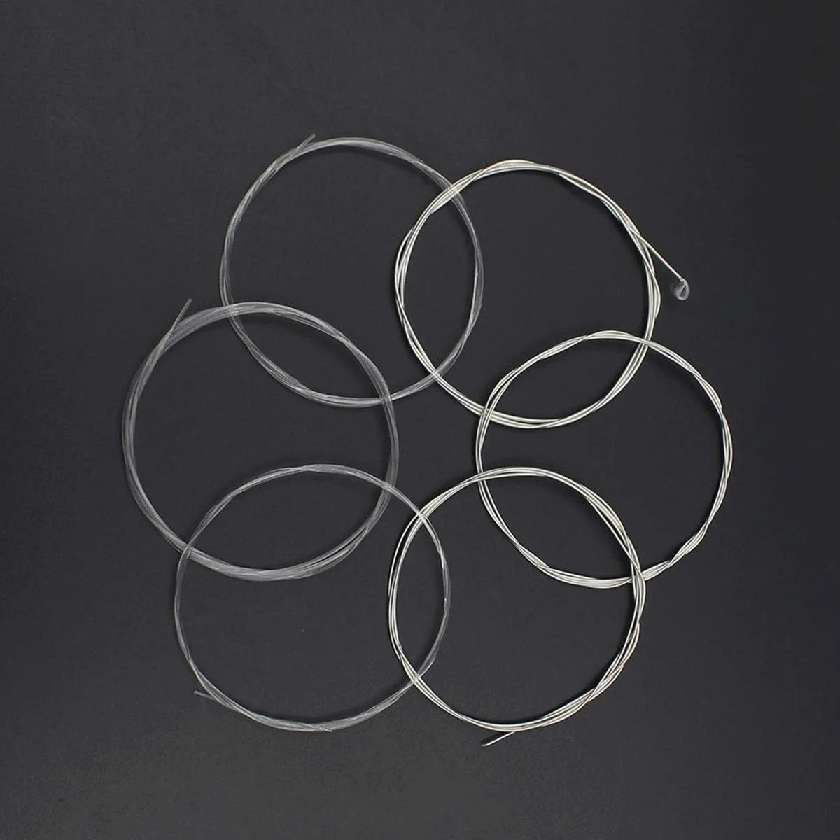 دو بسته کامل سیم گیتار کلاسیک نایلونی شفاف به همراه یک عدد ابزار تعویض سیم گیتار 3 در 1 شامل سیم پیچ گیتار، سیم چین گیتار و پین کش گیتار